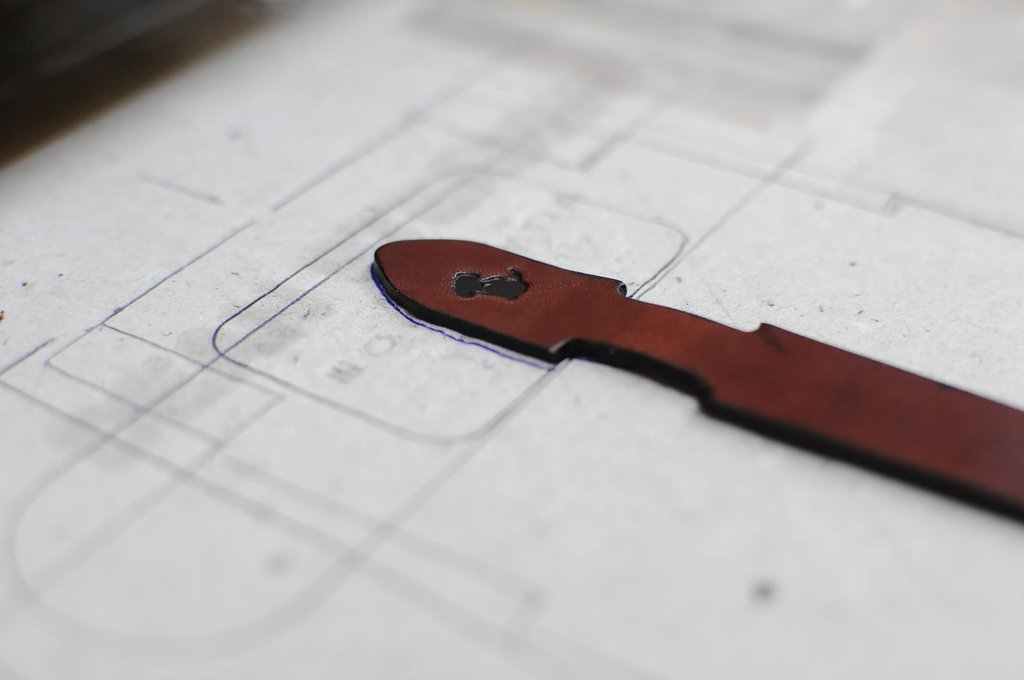 Luxury leather dog lead being crafted by a Leathersmith for Teddy Maximus